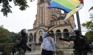 A person waves a flag during the European LGBTQ pride march in Belgrade, Serbia, September 17, 2022. 