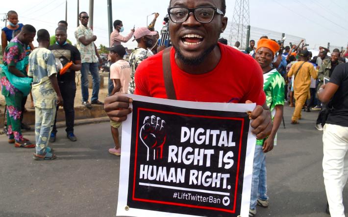 A demonstrator in Lagos holds a sign advocating for digital rights amidst nationwide protests over the Nigerian government's Twitter ban. Image credit: PIUS UTOMI EKPEI/AFP via Getty Images